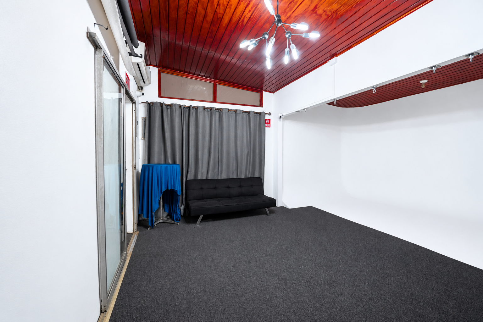 Cleaned white cyclorama and seating inside 21 Dahlia studio